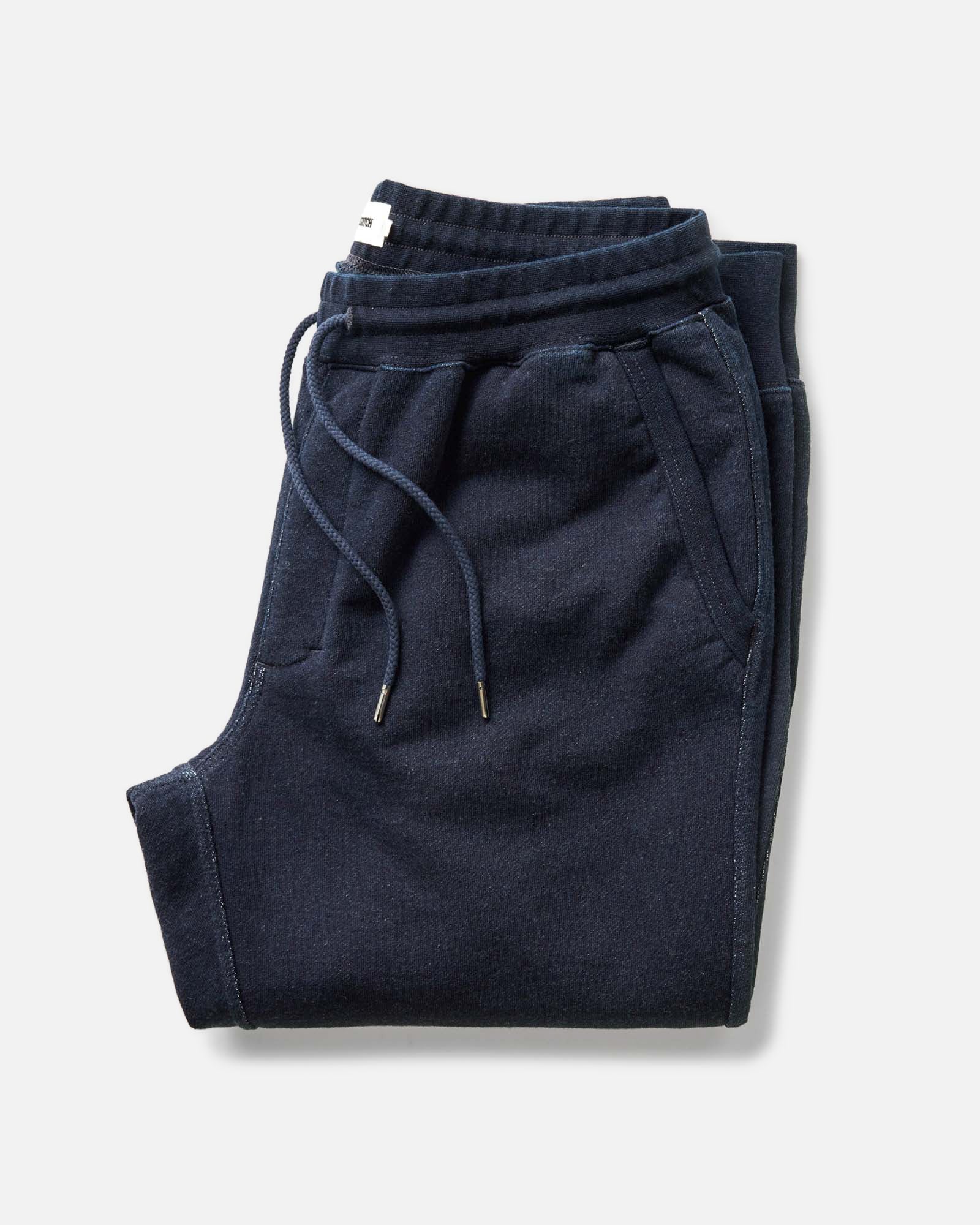 folded flatlay of The Sunset Pant in Rinsed Indigo Terry, Bottoms by Taylor Stitch