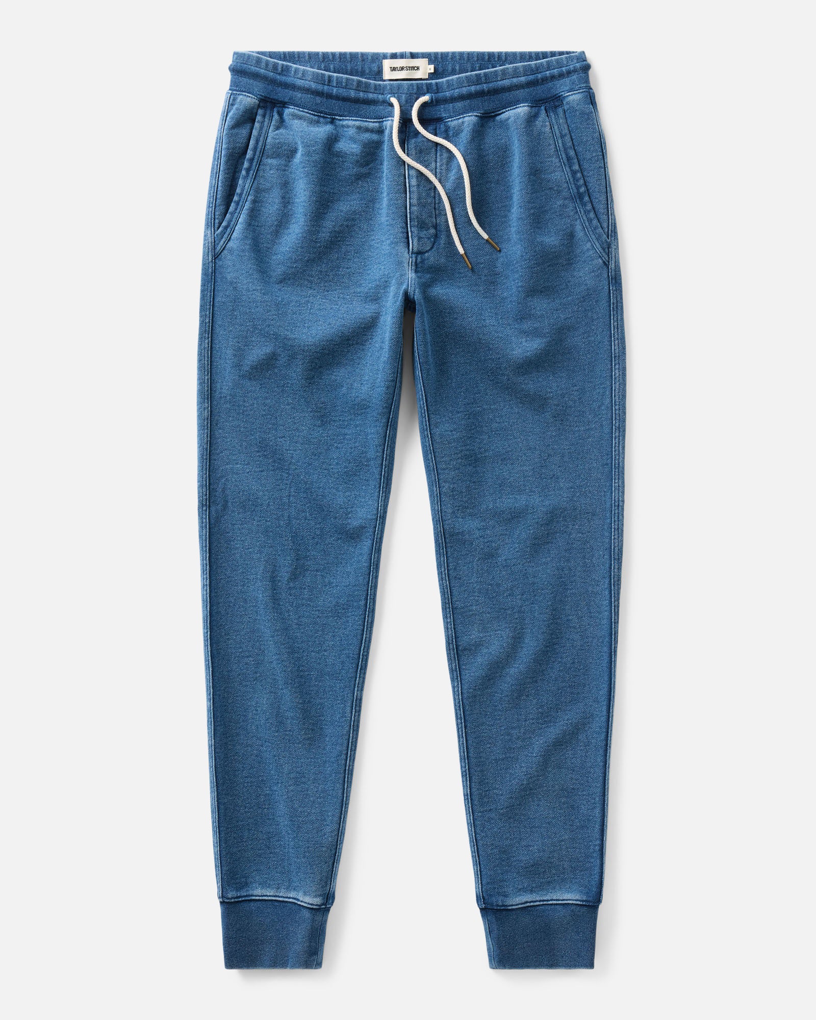 flatlay of The Sunset Pant in Washed Indigo Terry, Bottoms by Taylor Stitch