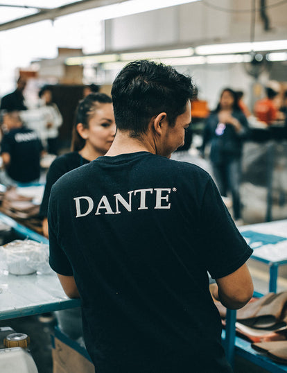 The back of a tee shirt with the word Dante.