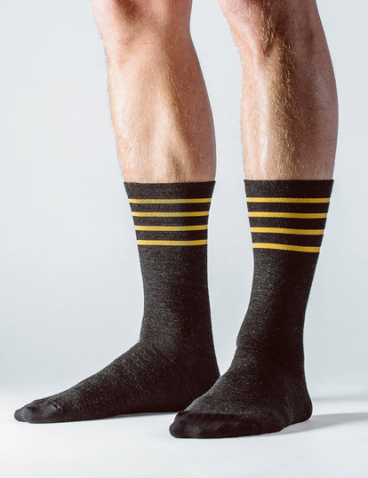 Feet, standing, wearing our merino socks.