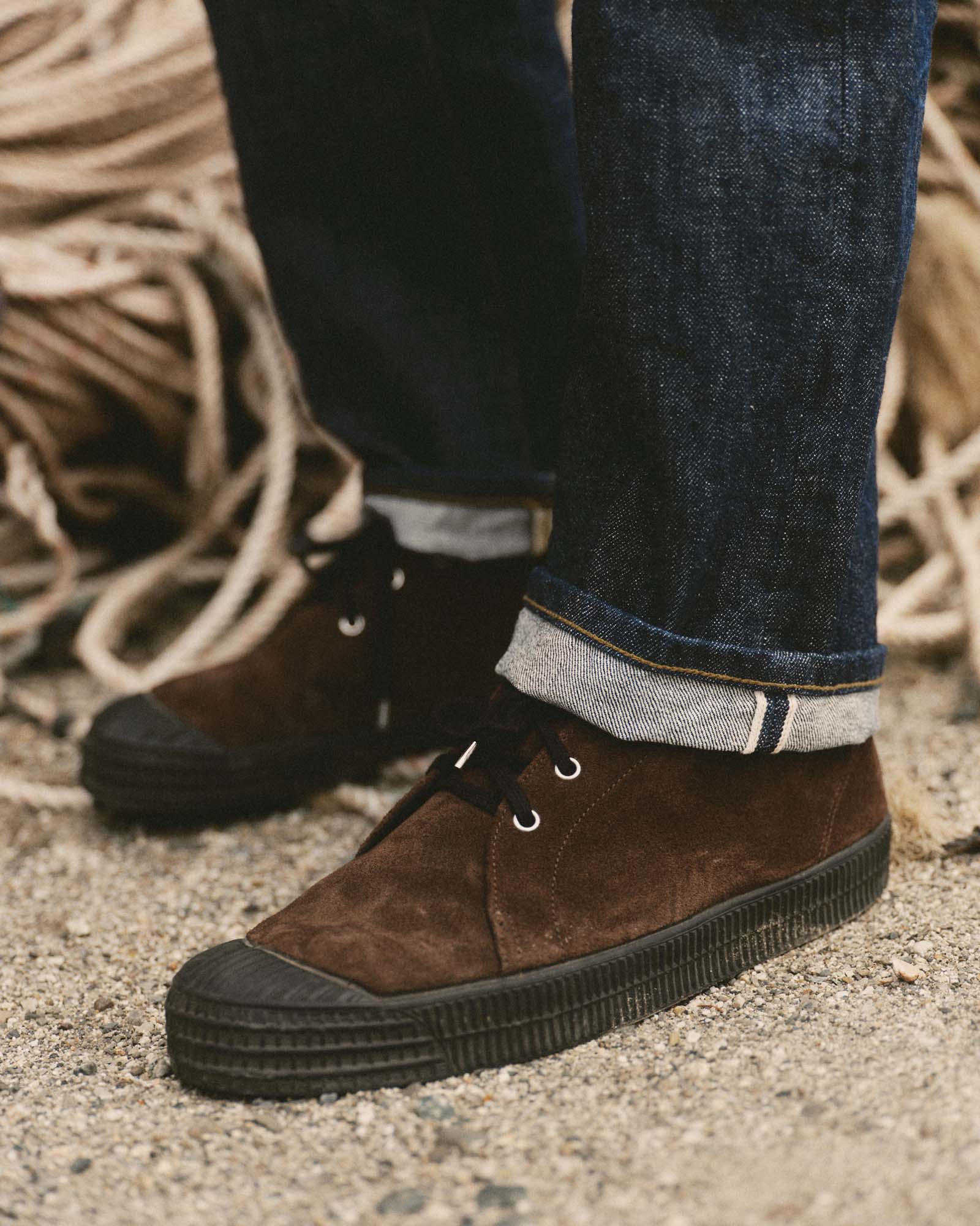 fit model showing off the cuffs on The Straight Jean in Rinsed Organic Selvedge, Bottoms by Taylor Stitch
