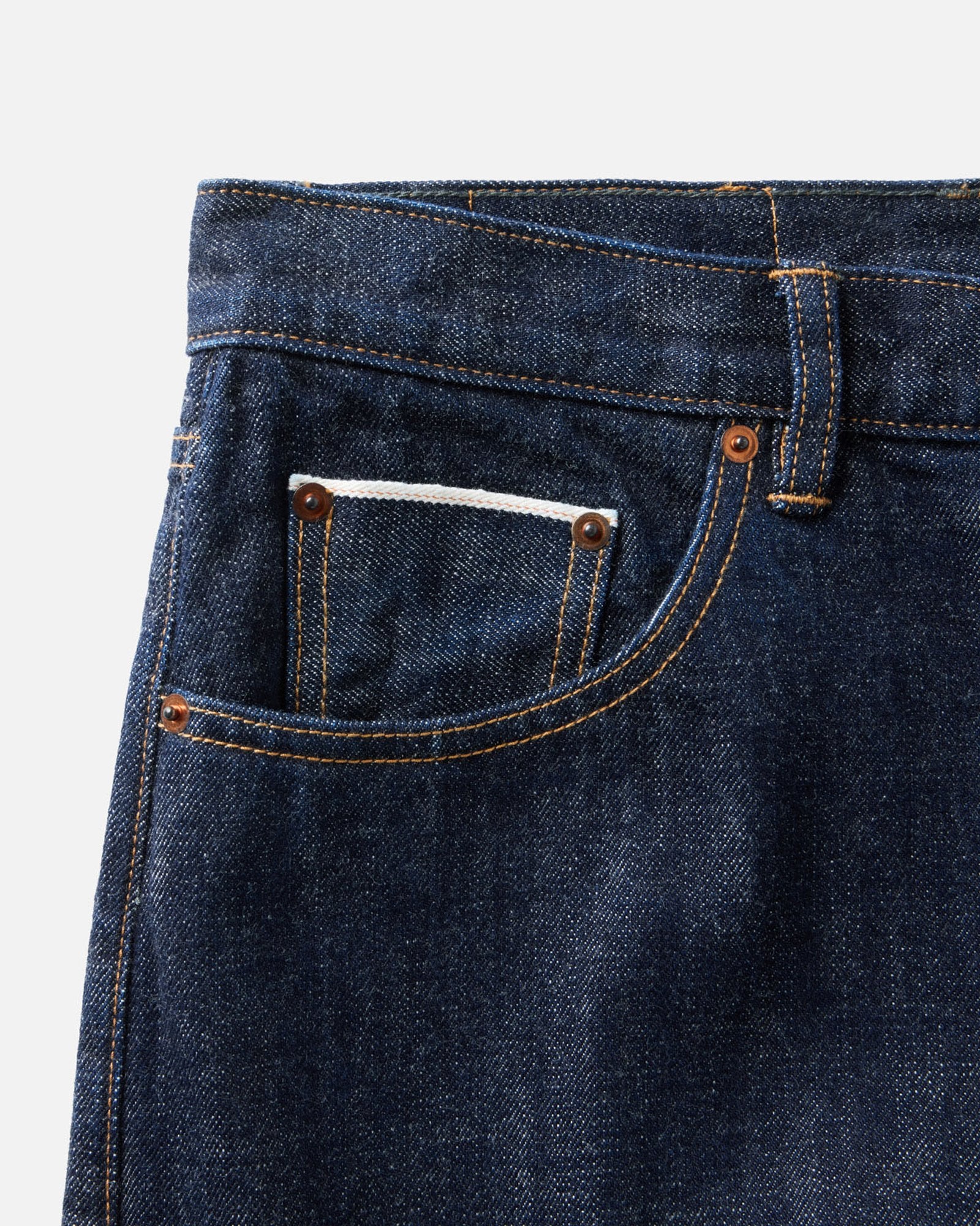 material shot of the pocket on The Straight Jean in Rinsed Organic Selvedge, Bottoms by Taylor Stitch