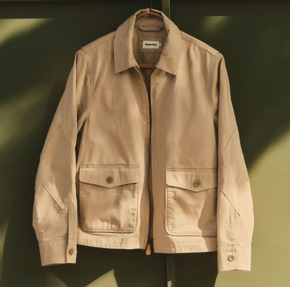 editorial image of a jacket hanging, by Taylor Stitch