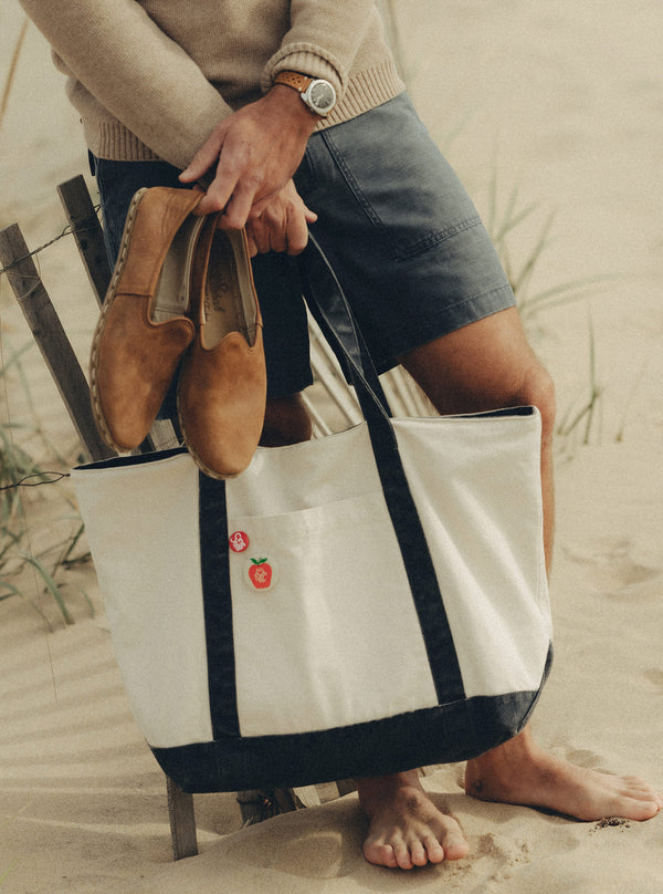 Model holding the Schooner Tote and a pair of Sabahs