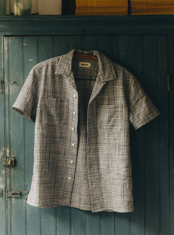 The Conrad Shirt in Cloud Cover hanging on a wall