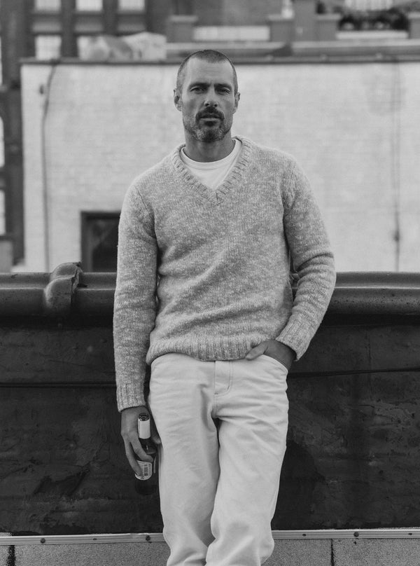 Black and white image of model in The Match Sweater