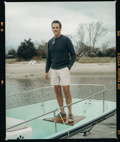 Model wearing The Crawford Crew Sweater and The Après Short in Foundation Twill