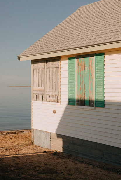 A saltbox house by the ocean