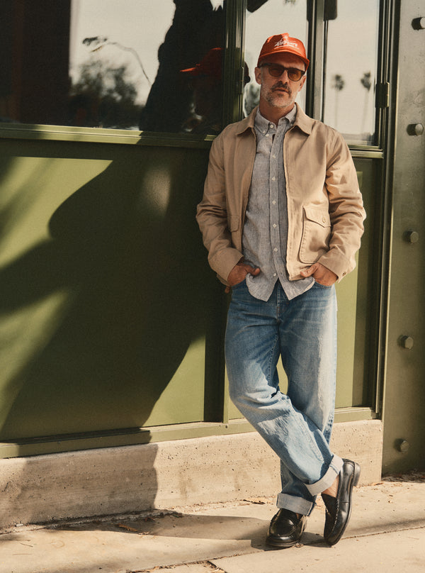 Model wearing the Airman Jacket with The Jack in Burgundy University Stripe