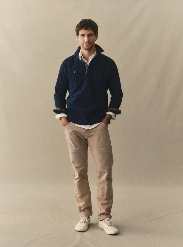 Model in The Canal Popover in Rinsed Indigo and vintage chore pants