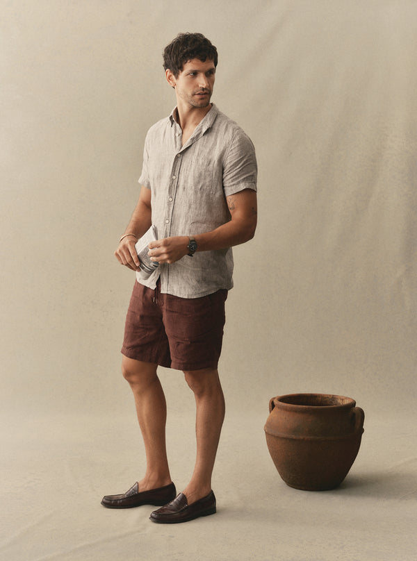 Model wearing The Short Sleeve Jack in Sage Linen with the Après Short in Burgundy Hemp
