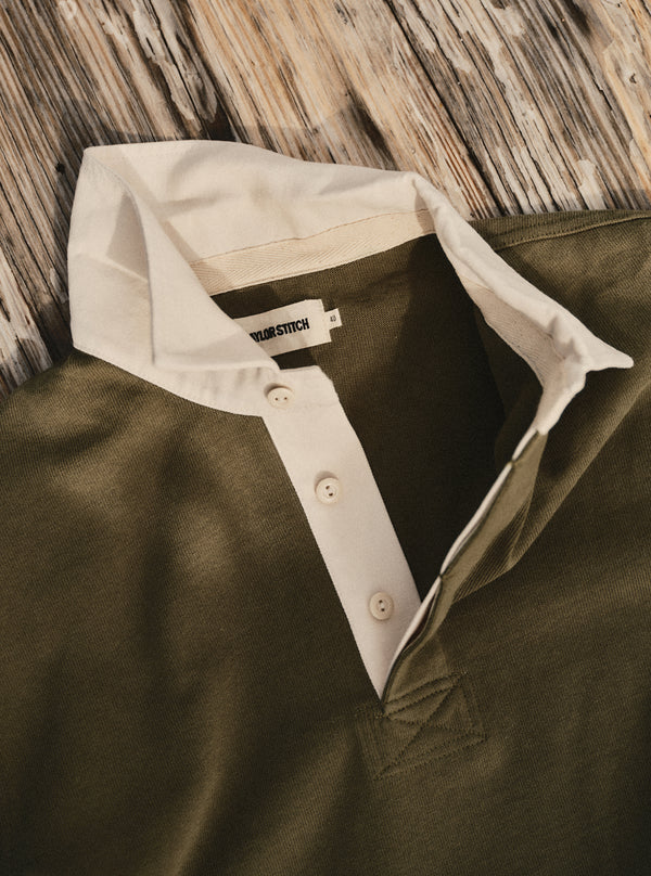 Close up of the collar and rubber buttons on The Rugby Shirt in Burnt Olive