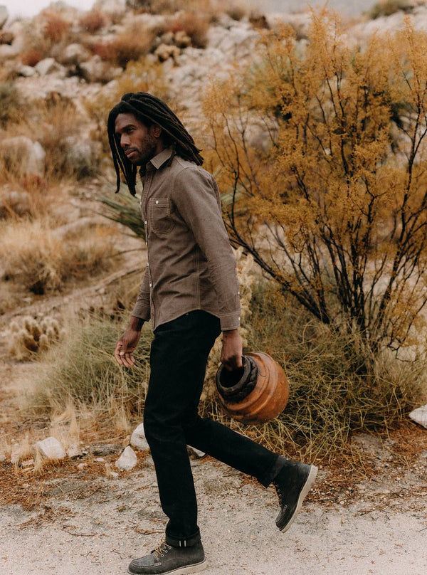 Model wearing The Utility Shirt in Soil Nep