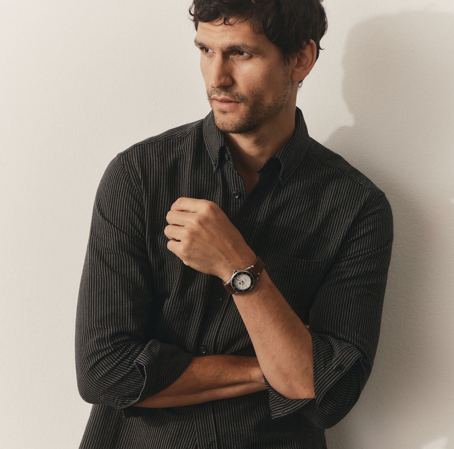 Model wearing The Jack in Roped Black Indigo, by Taylor Stitch