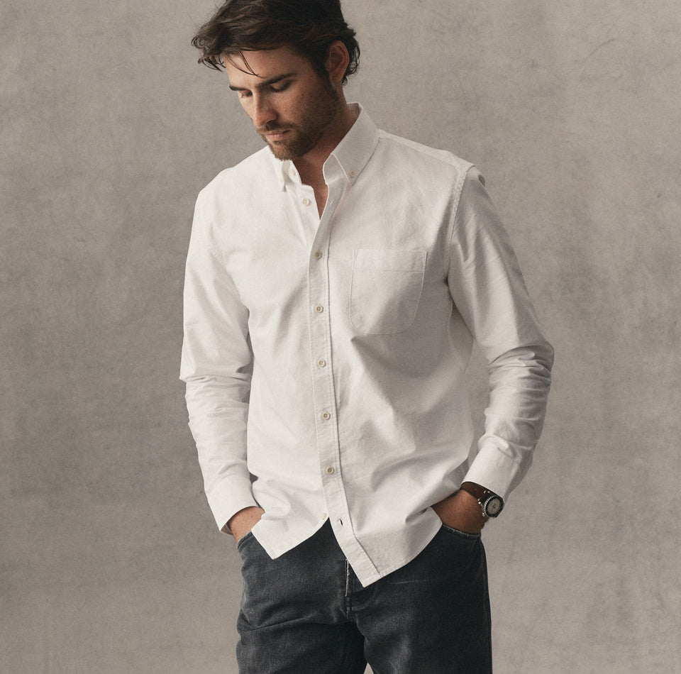 fit model posing in The Jack in White Everyday Oxford, by Taylor Stitch
