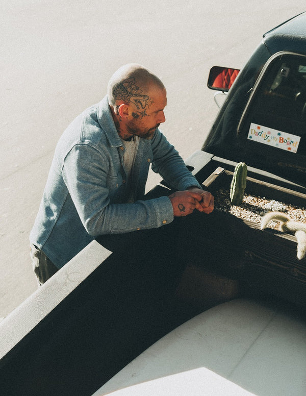Scott Clark standing by his truck