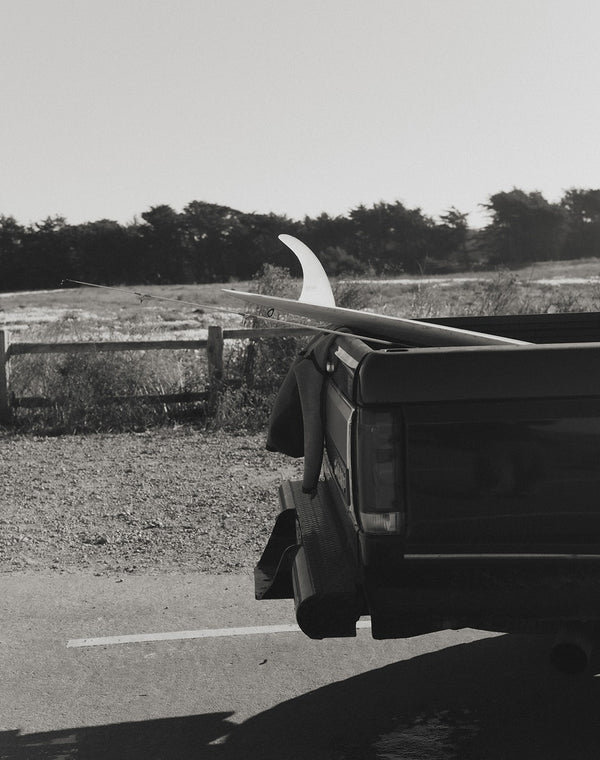 Surfboard out the back of Scott's truck