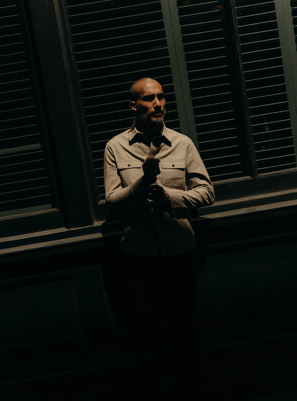 Model adjusting the sleeves of the Yosemite Shirt