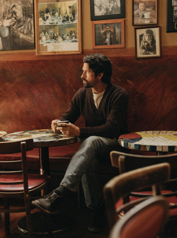 Model sitting in Caffe Trieste