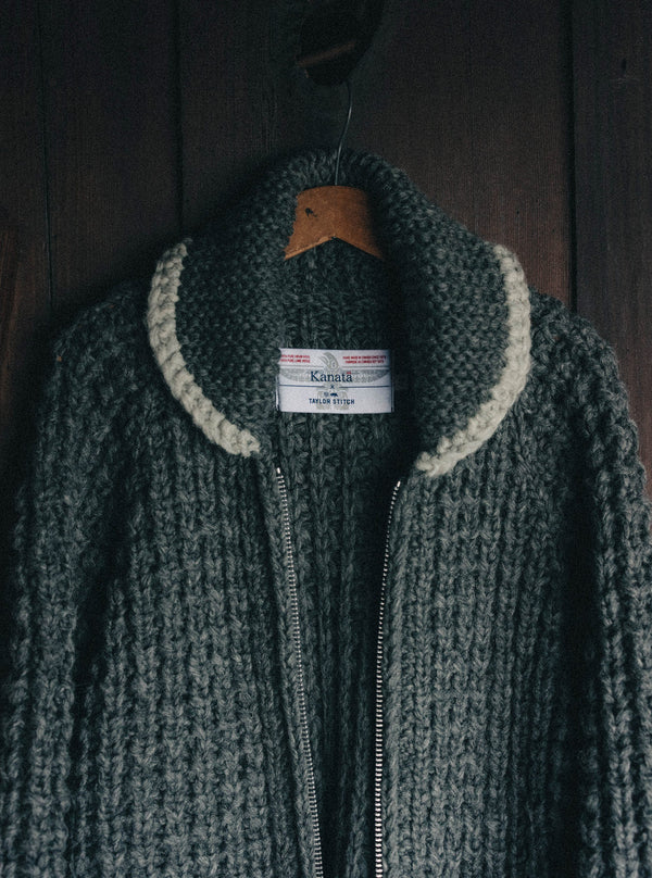 Model sitting on a window ledge of a cabin