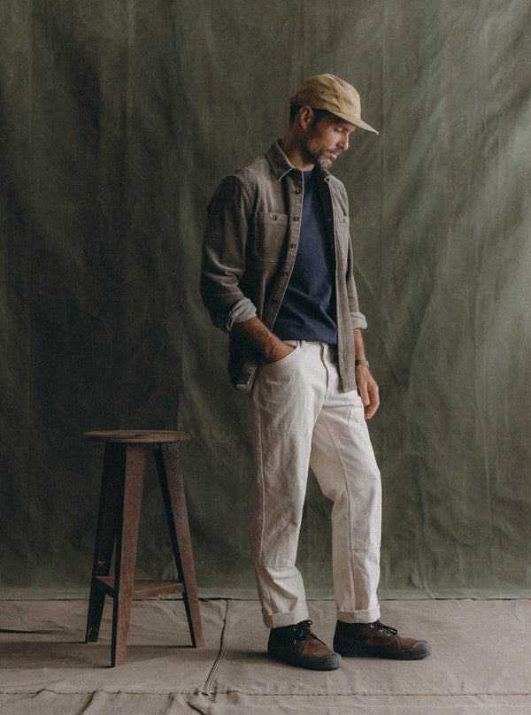 Model in studio, wearing The Utility Shirt