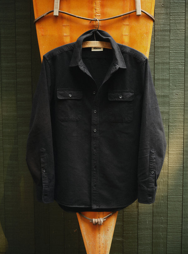 The Yosemite Shirt hanging on a canoe