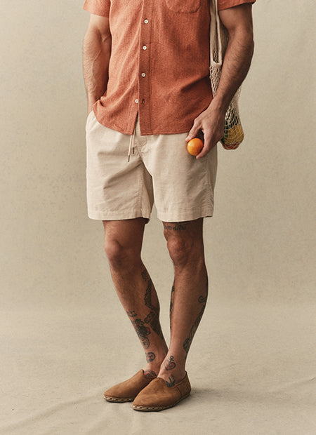 Model wearing the Après Short in Heather Oat Pincord , by Taylor Stitch