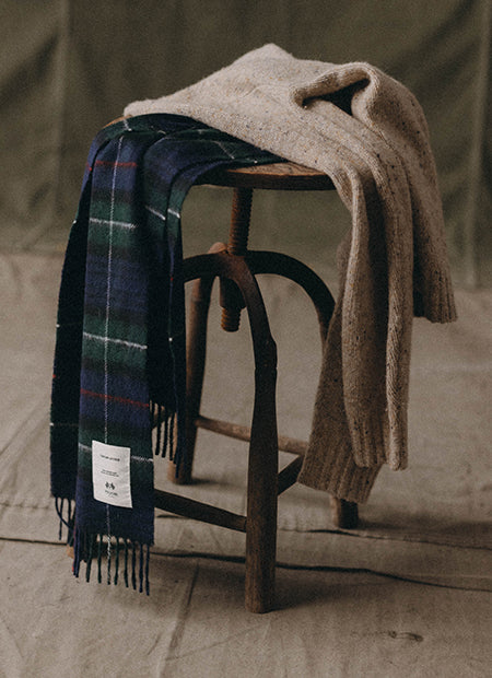 editorial image of scarves on a stool, by Taylor Stitch