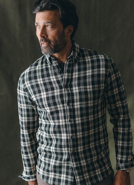 fit model posing in The Jack in Rinsed Indigo Plaid, by Taylor Stitch