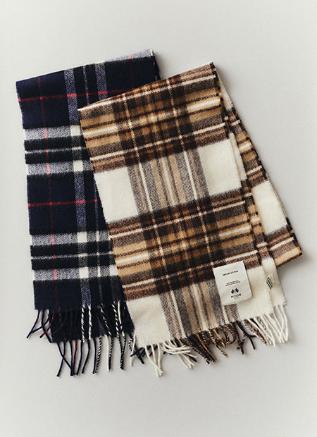 editorial flatlay of various Fireside Scarves, by Taylor Stitch