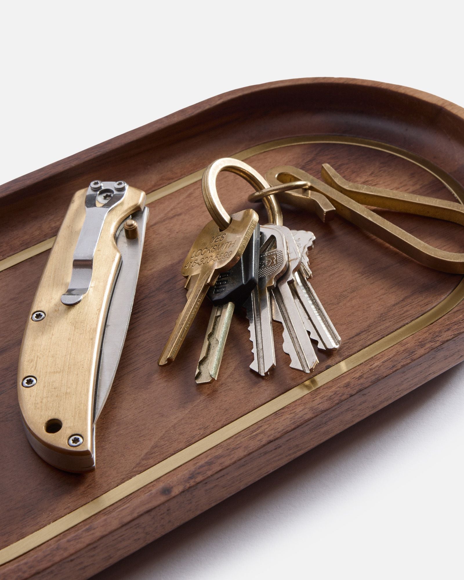 The Valet Tray in Walnut and Brass with keys and knife, Accessories by Taylor Stitch