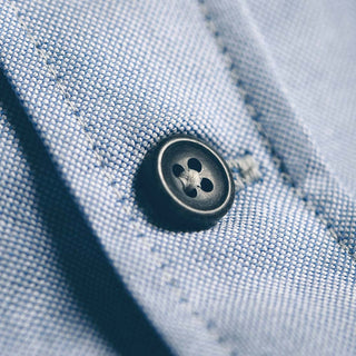 The placket of the shirt in great detail.