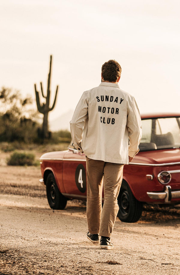 nico wearing the ojai near his car