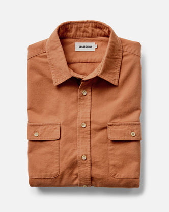 folded flatlay of The Yosemite Shirt in Summit Orange