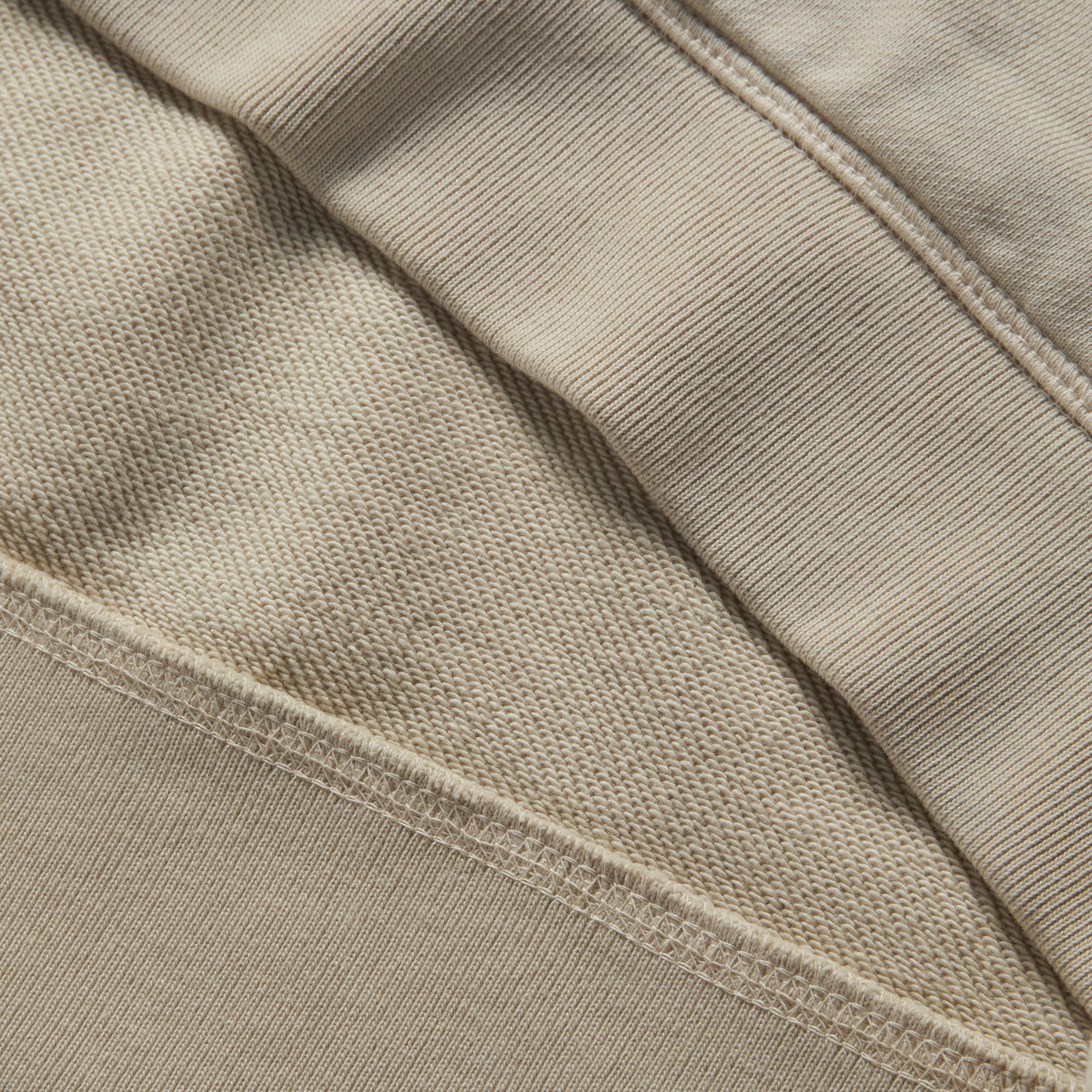 material shot of the ribbed edges on The Fillmore Hoodie in Natural, Knits by Taylor Stitch