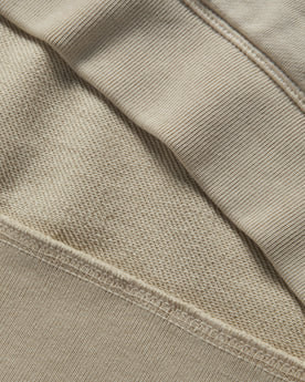 material shot of the ribbed edges on The Fillmore Hoodie in Natural, Knits by Taylor Stitch