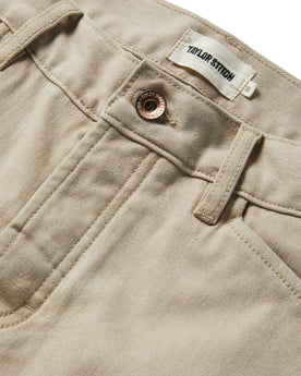 material shot of the button opening and fly of The Camp Pant in Sand Boss Duck, Bottoms by Taylor Stitch