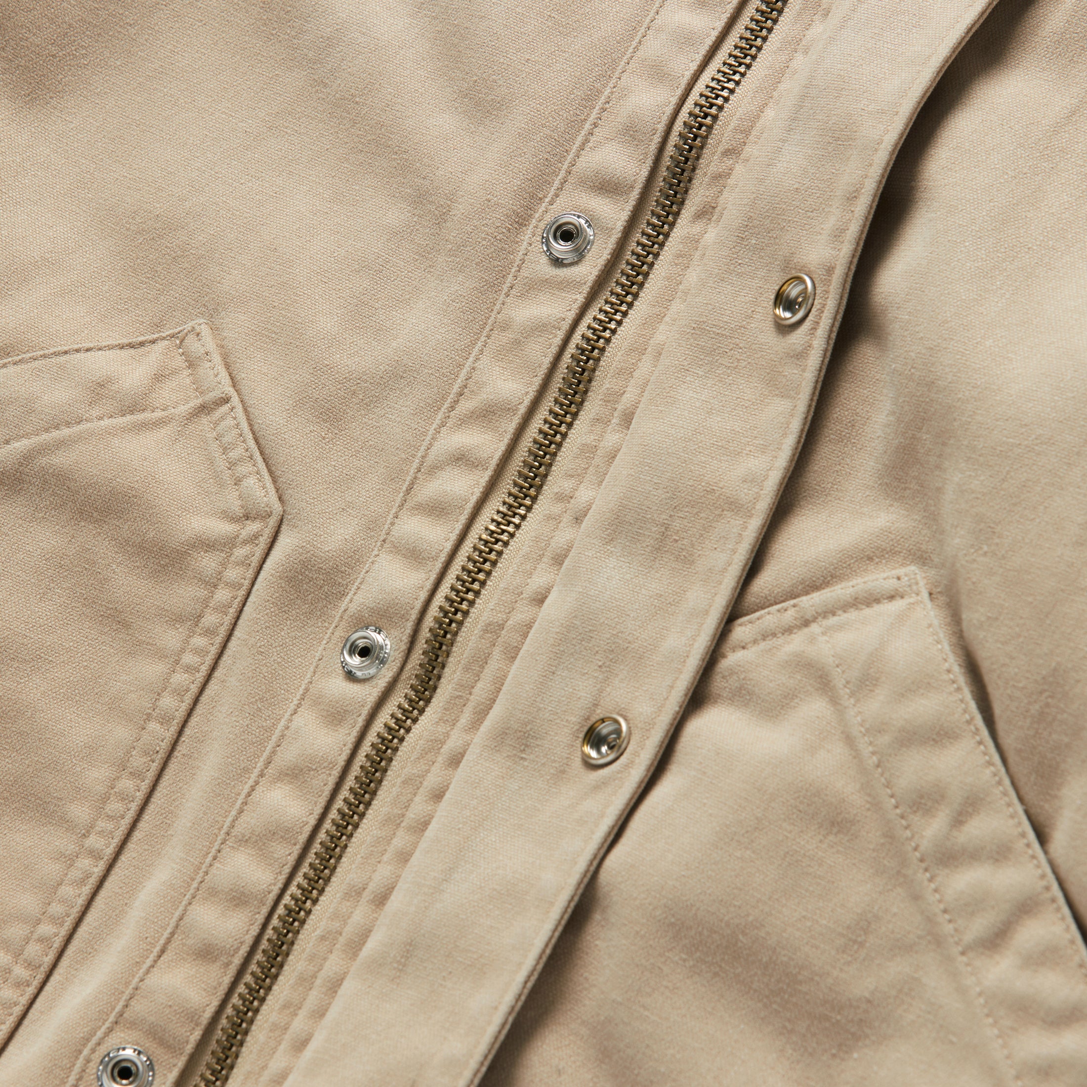 material shot of the buttons and zipper on The Workhorse Hoodie in Sand Boss Duck, Outerwear by Taylor Stitch