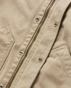 material shot of the buttons and zipper on The Workhorse Hoodie in Sand Boss Duck, Outerwear by Taylor Stitch
