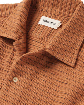 material shot of the collar of The Short Sleeve Hawthorne in Rust Pickstitch Waffle, Wovens by Taylor Stitch