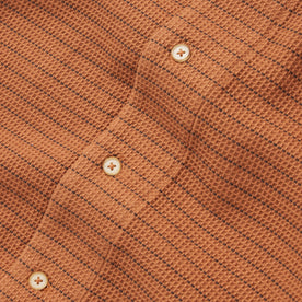 material shot of the buttons on The Short Sleeve Hawthorne in Rust Pickstitch Waffle