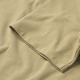 material shot of the sleeve on The Heavy Bag Tee in Khaki Dahlia