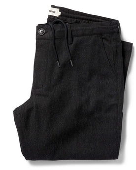 flatlay of The Carmel Pant in Dark Charcoal folded, Bottoms by Taylor Stitch