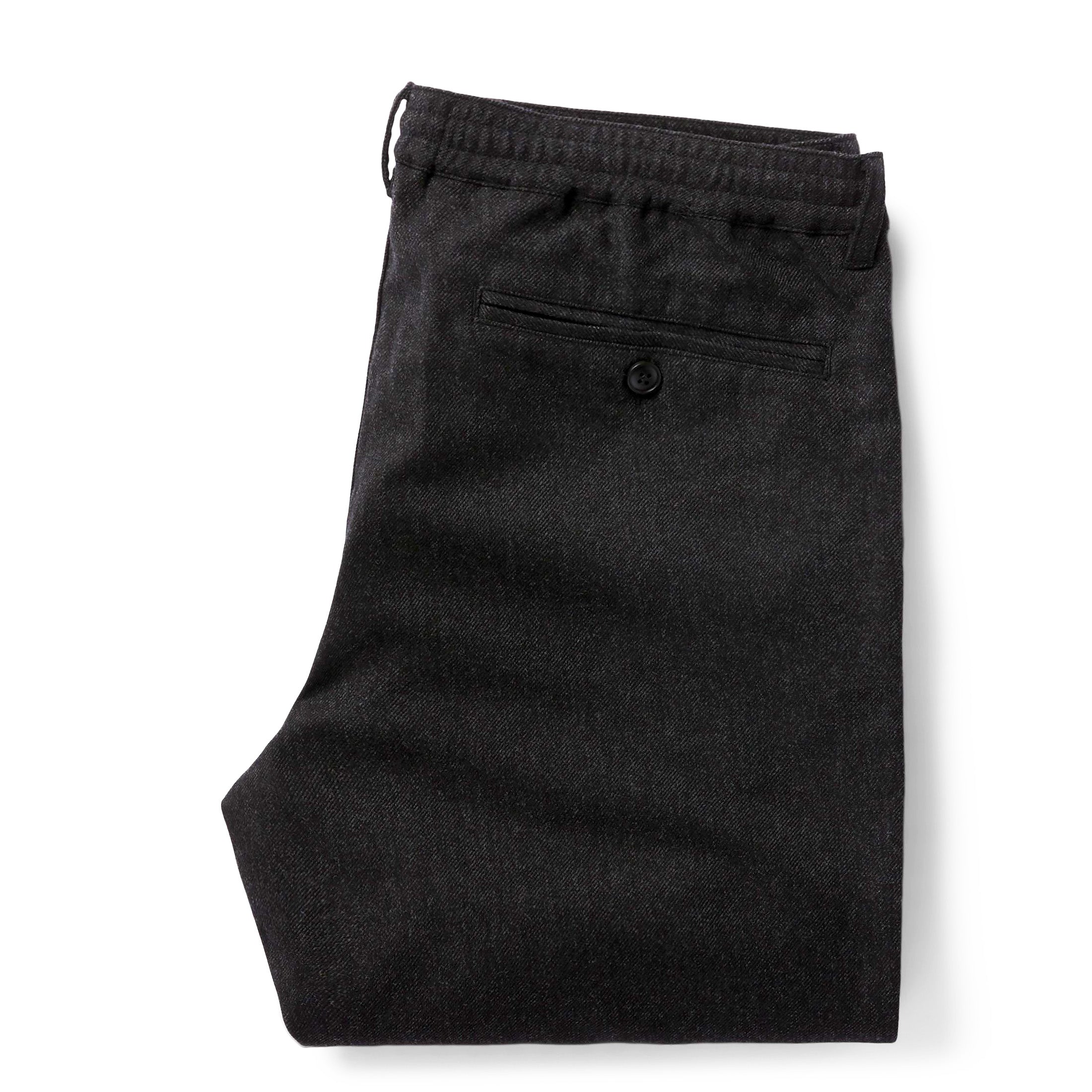 flatlay of the back of The Carmel Pant in Dark Charcoal folded, Bottoms by Taylor Stitch