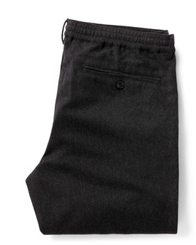 flatlay of the back of The Carmel Pant in Dark Charcoal folded, Bottoms by Taylor Stitch