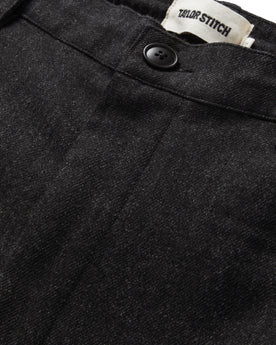 material shot the button fly of The Carmel Pant in Dark Charcoal, Bottoms by Taylor Stitch