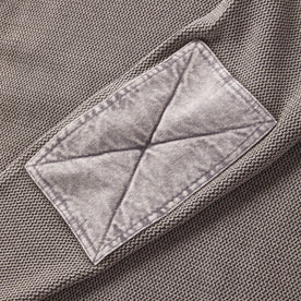 material shot of the elbow patches on The Moor Sweater in Steeple Grey