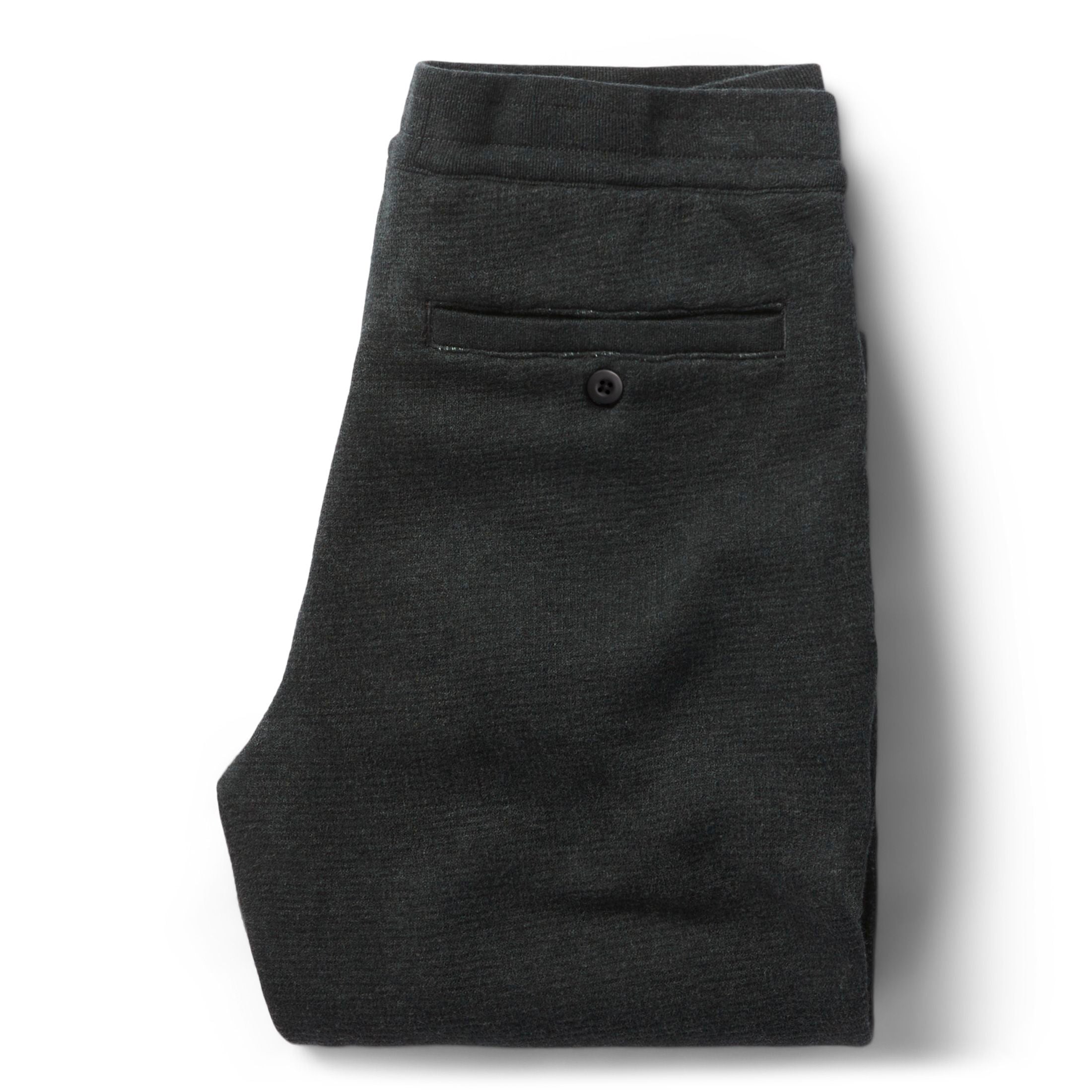flatlay of The Weekend Pant in Coal Double Knit, folded from the back, Knits by Taylor Stitch