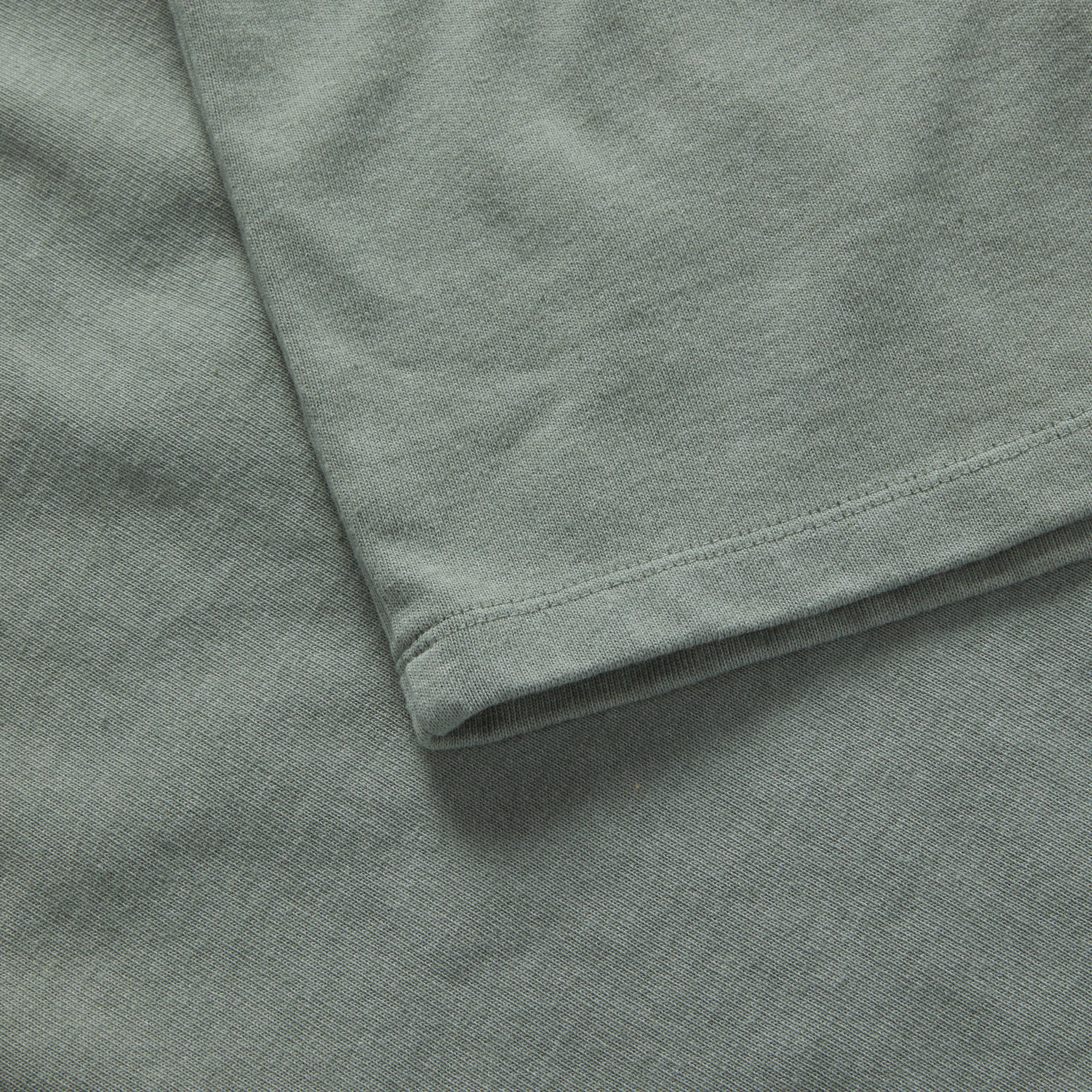 material shot of the sleeve on The Heavy Bag Tee in Slate, Knits by Taylor Stitch