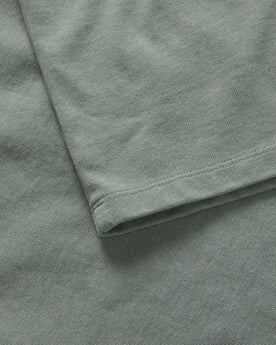 material shot of the sleeve on The Heavy Bag Tee in Slate, Knits by Taylor Stitch